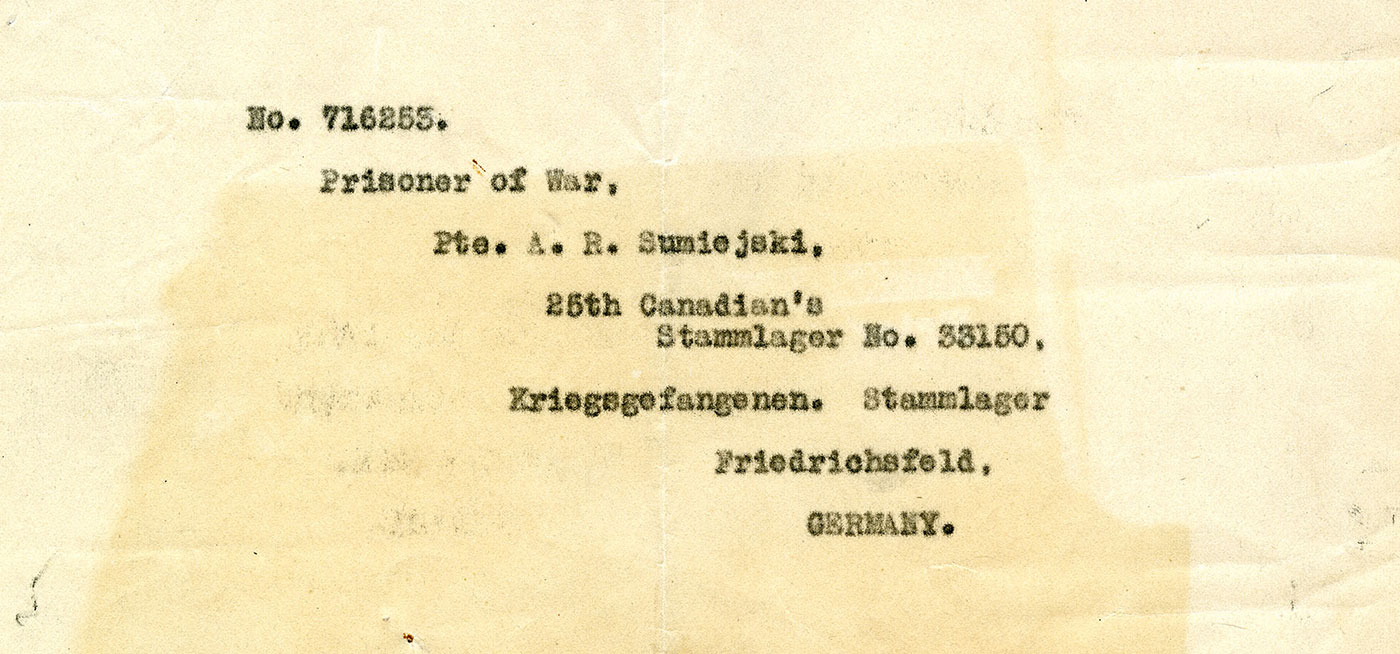 Item is a sepia coloured letter featuring a typewritten address for a prisoner of war in Germany.