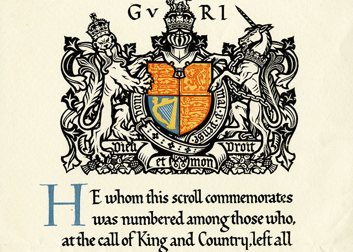 Colour commemorative scroll featuring a royal crest and handlettering. Sumiejski's name is written in red ink at the bottom of the document.
